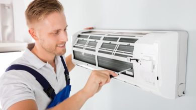 man doing air conditioner service