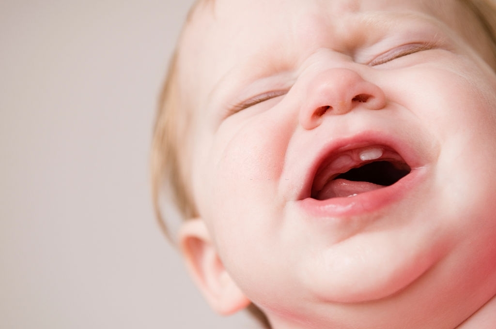 teething pain in newborn infants