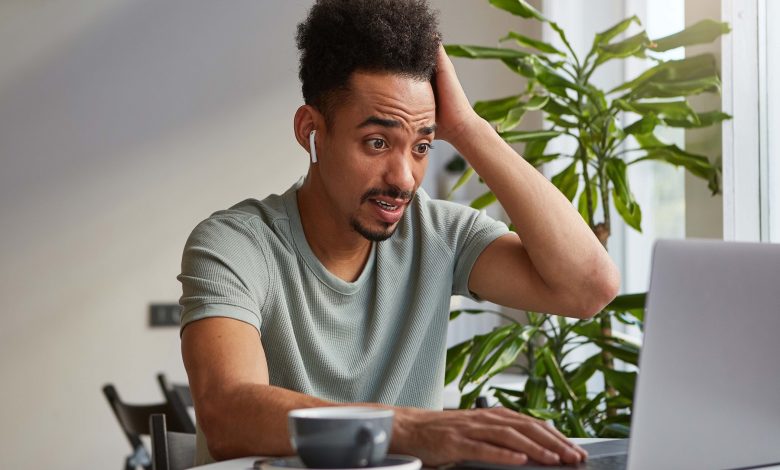 Confused Man reading about misconceptions