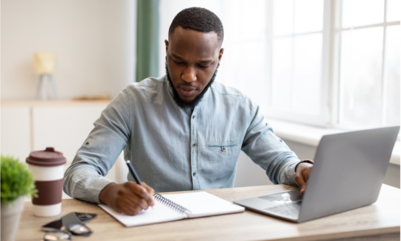 african businessman working on laptop